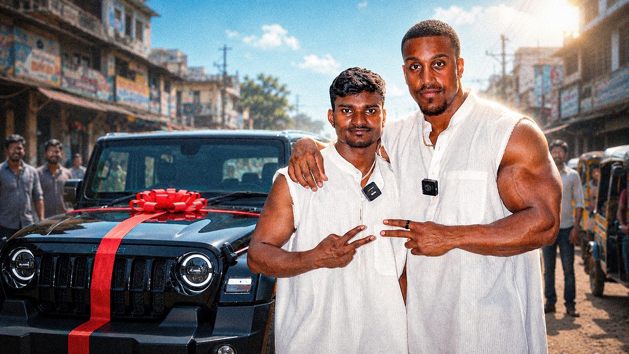 Ashton Hall supporting a friend beside a gifted car